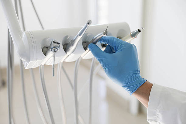 Professional Tooth Extraction technician working in Milam, TX